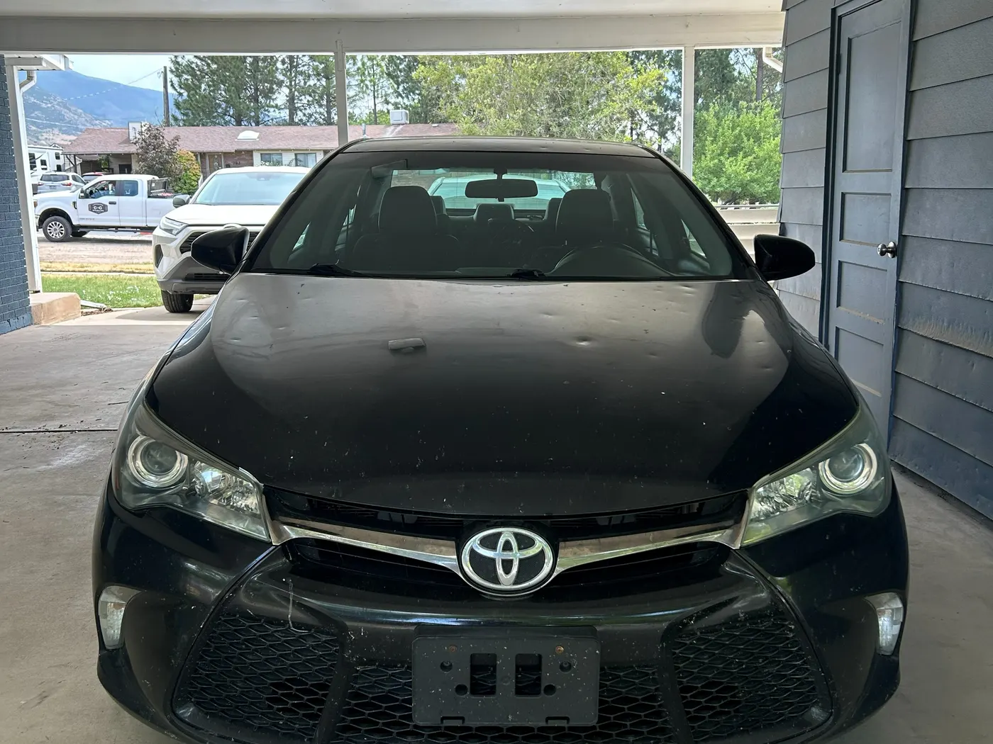 The same Camry from the front after restoration, both headlights clear and bright